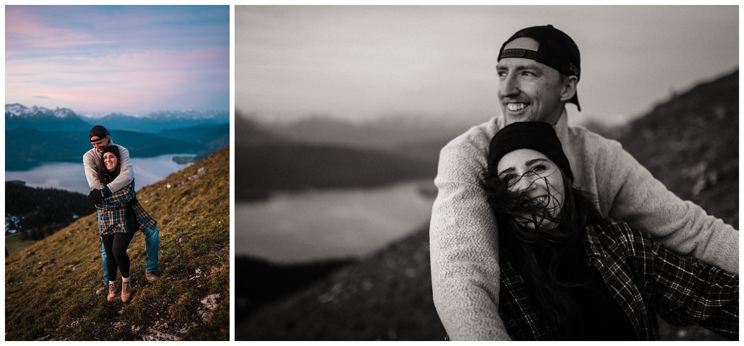 A couple hugging each other on a mountain top at sunrise 